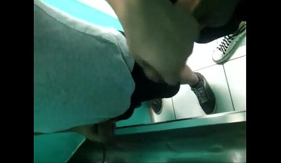 Hung Hunk Hooks Up in Steamy Public Bathroom